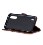 LuxeBass hoesje geschikt voor Samsung Galaxy A10s hoesje book case + 2 stuks Glas Screenprotector bruin